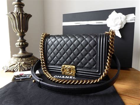 chanel boy bag medium black and gold|Chanel boy bag price.